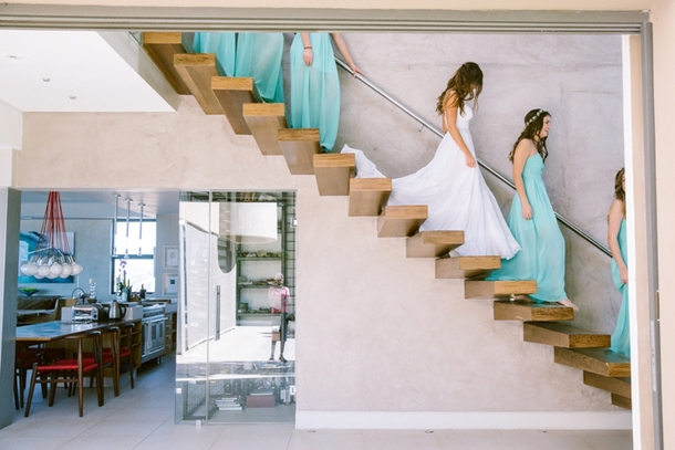 Bridesmaids Descending Staircase | Credit: Lad & Lass