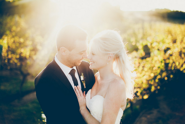 Bride and Groom in Vineyards by Fiona Clair Photography