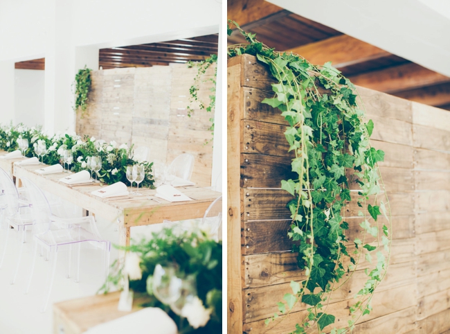 Wedding Reception with Greenery and Raw Wooden Elements 