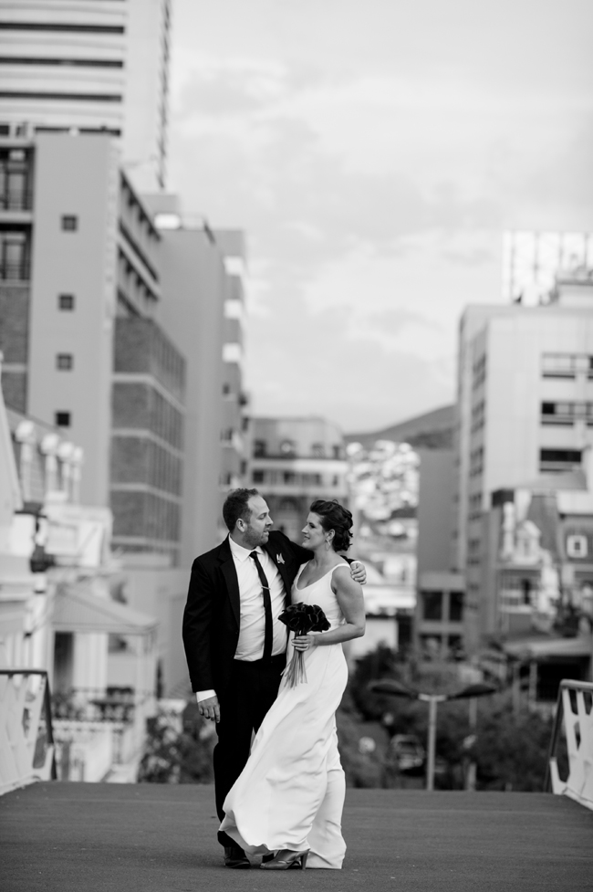 Bride and Groom in City  by Jules Morgan Photography