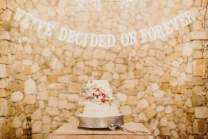 Charming Forest Wedding Cake with Letter Bunting| Credit: Carolien & Ben