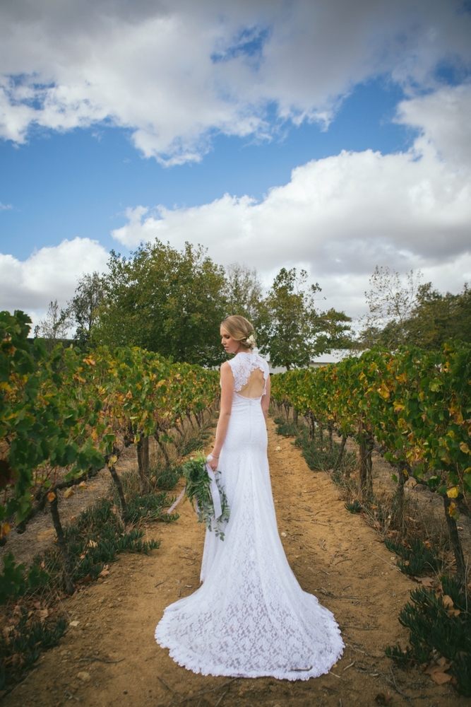 Bride in Keyhole Back Lace Wedding Dress