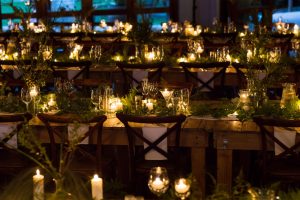Tables with Greenery Runners and Candles
