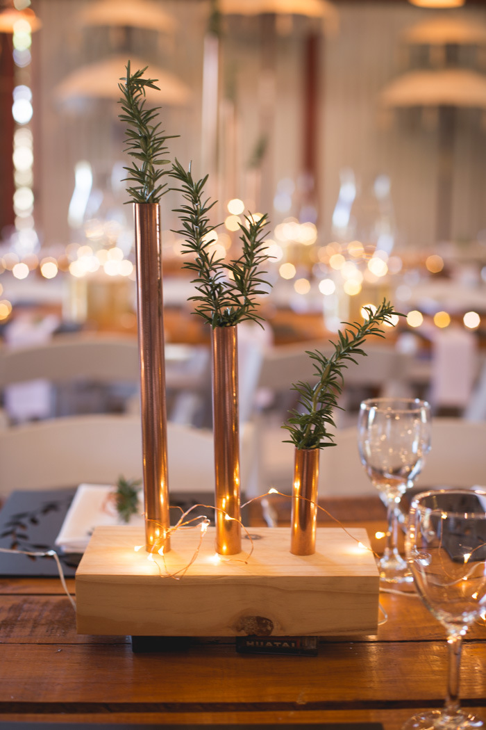 Copper Pipe Vase Centerpiece | Credit: Those Photos