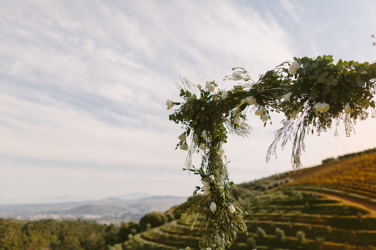 Greenery Ceremony Arch | Credit: Kikitography