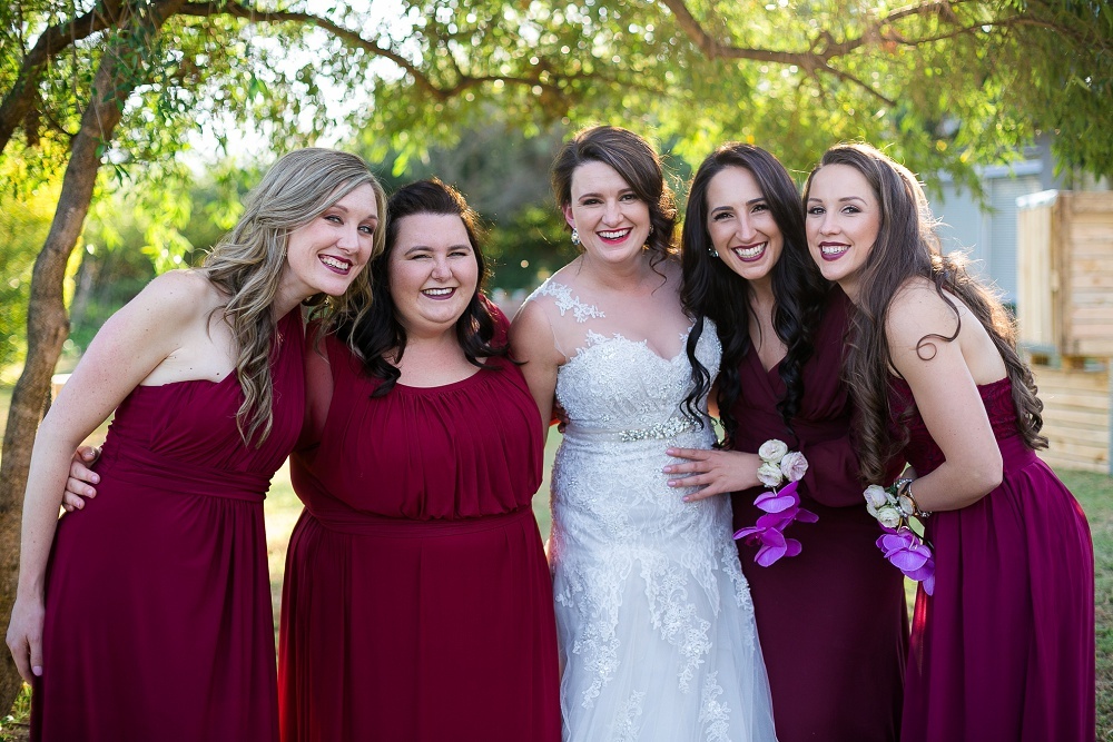 Maroon Bridesmaid Dresses | Credit: Karina Conradie