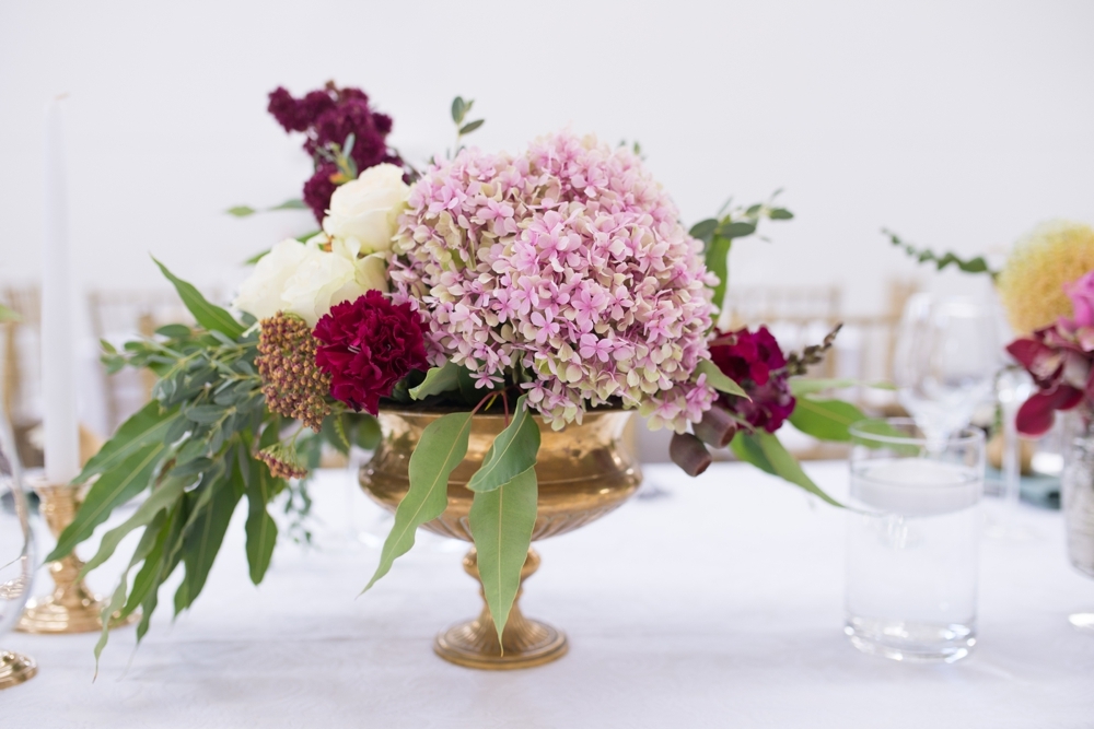 Berry Tone Centerpiece in Gold Vase | Credit: Cheryl McEwan