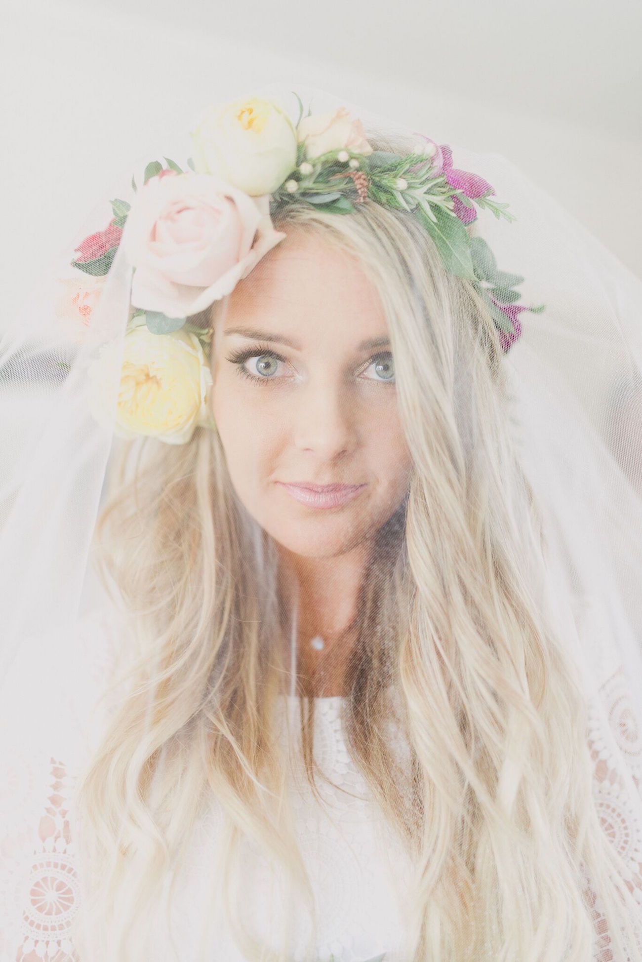 Bride in Flower Crown and Veil | Credit: Vicky Bergallo