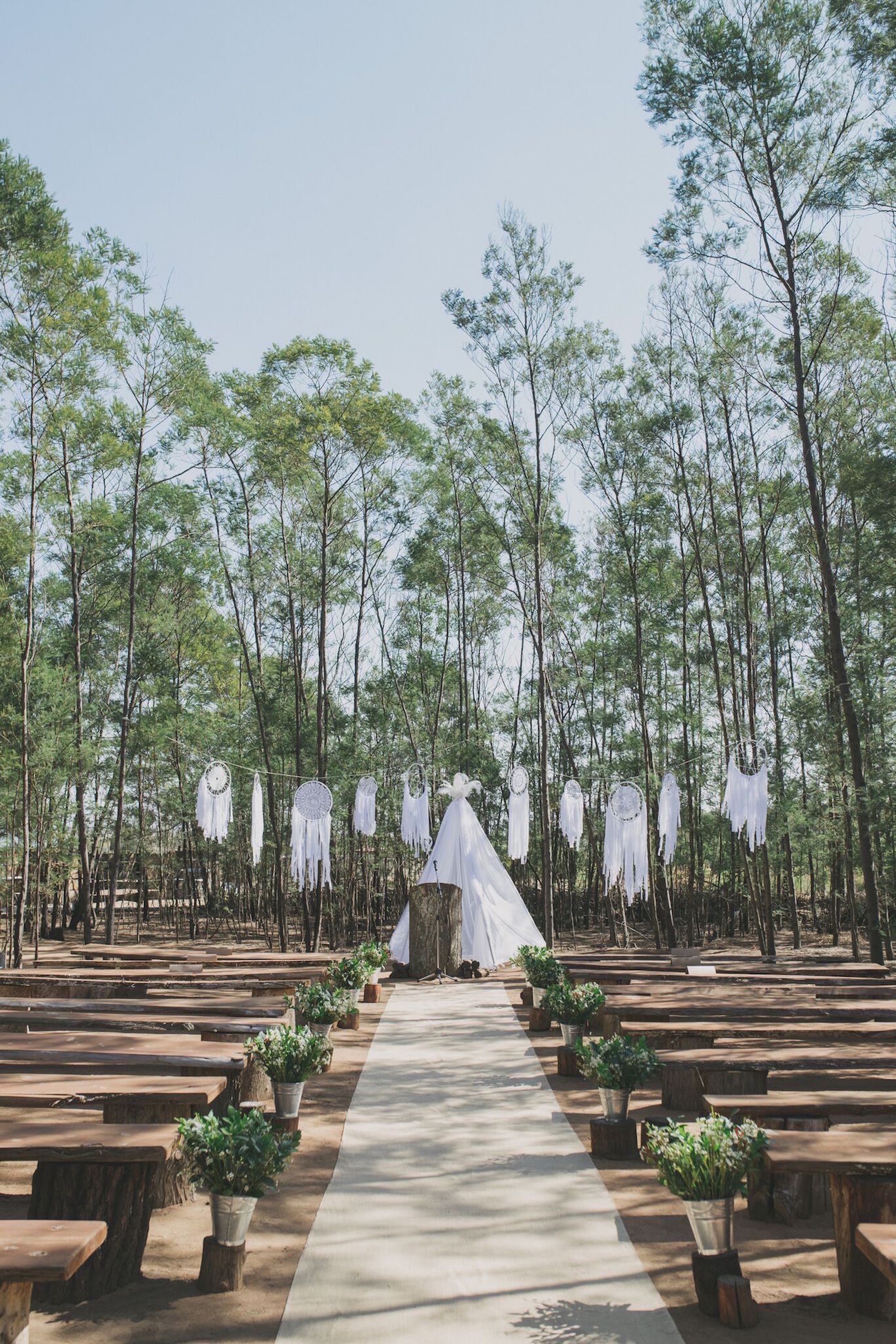 Boho Wedding Ceremony Decor with Tipi | Credit: Vicky Bergallo