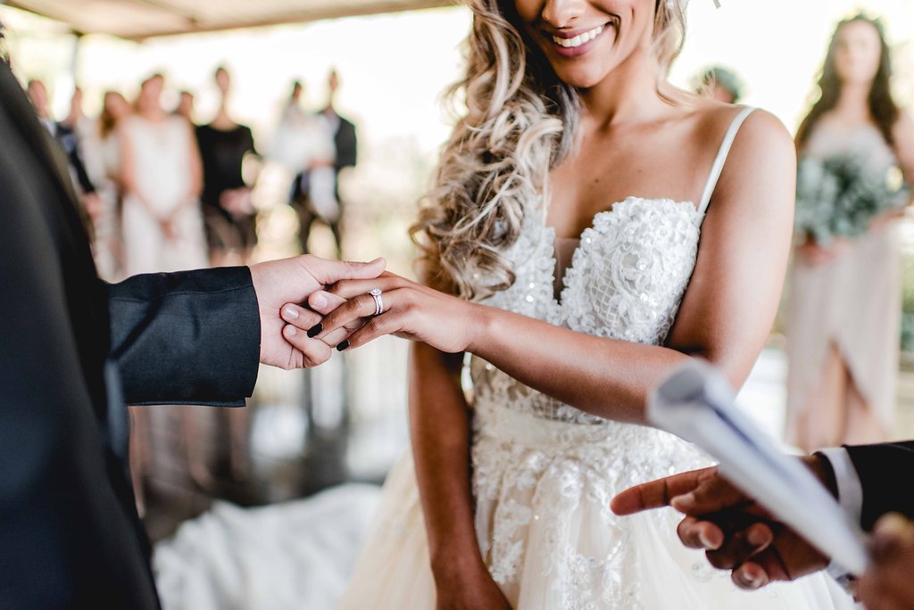 Wedding Ceremony Ring Exchange | Image: Carla Adel