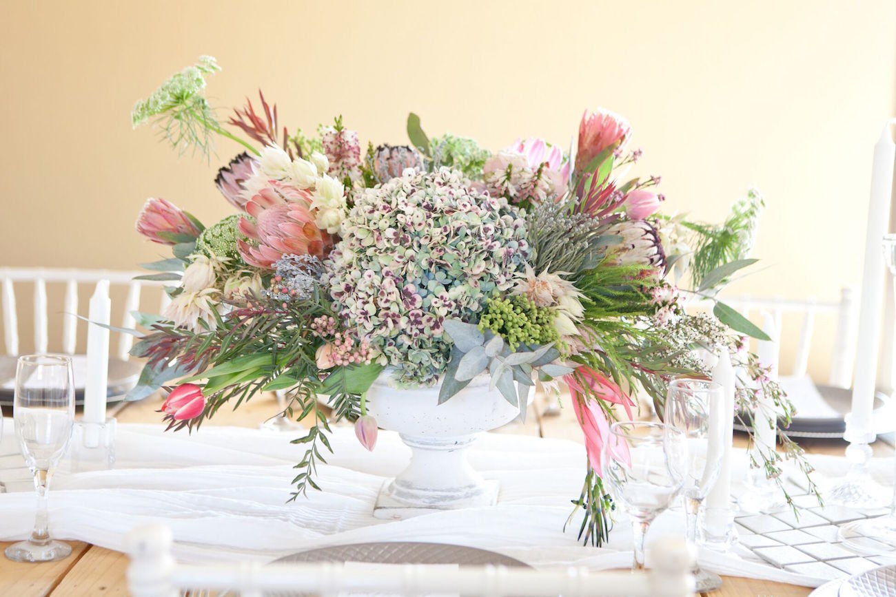 Protea & Hydrangea Centerpiece | Image: Corette Faux