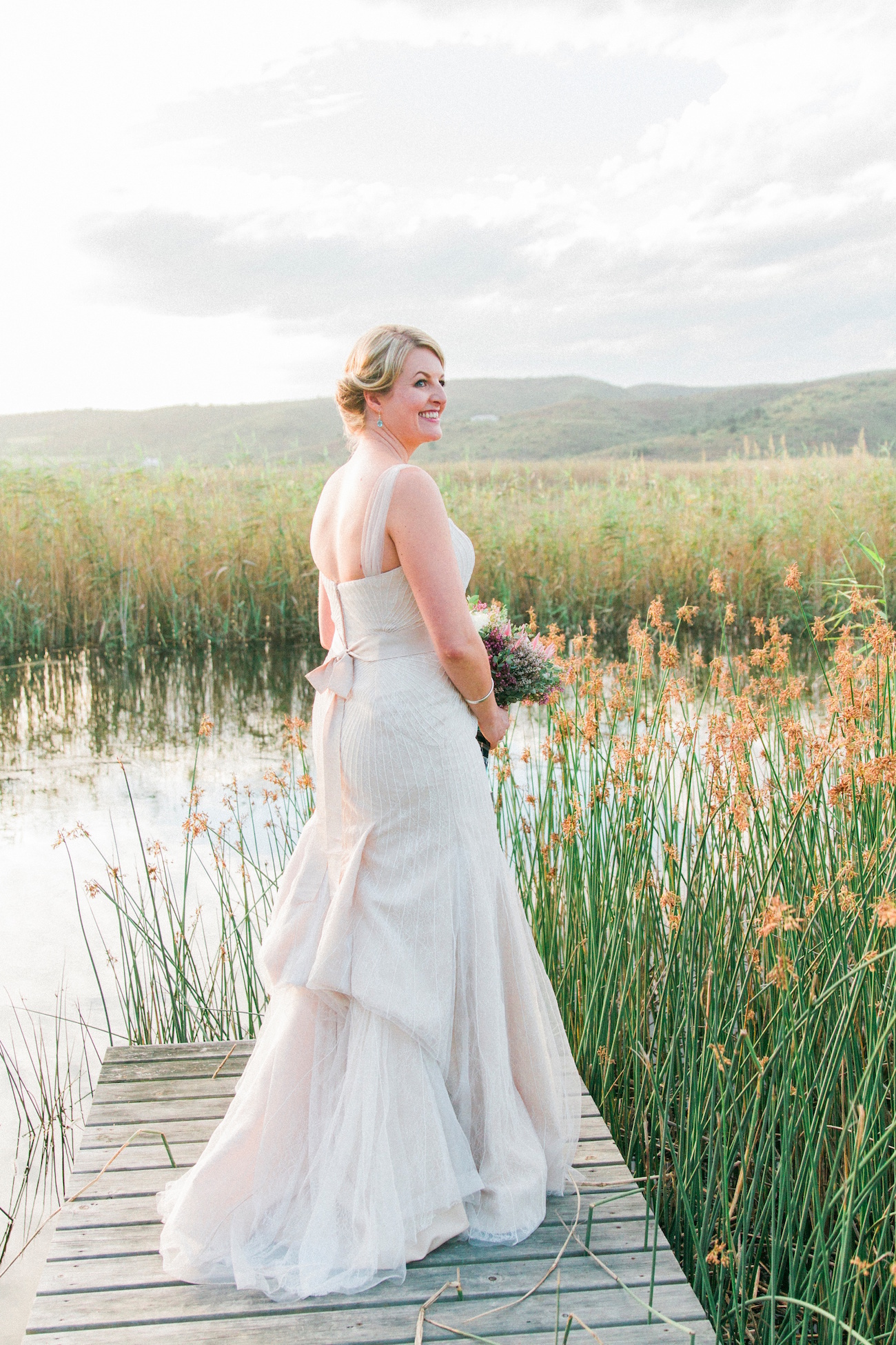 Bride in Zac Posen | Image: Maxeen Kim