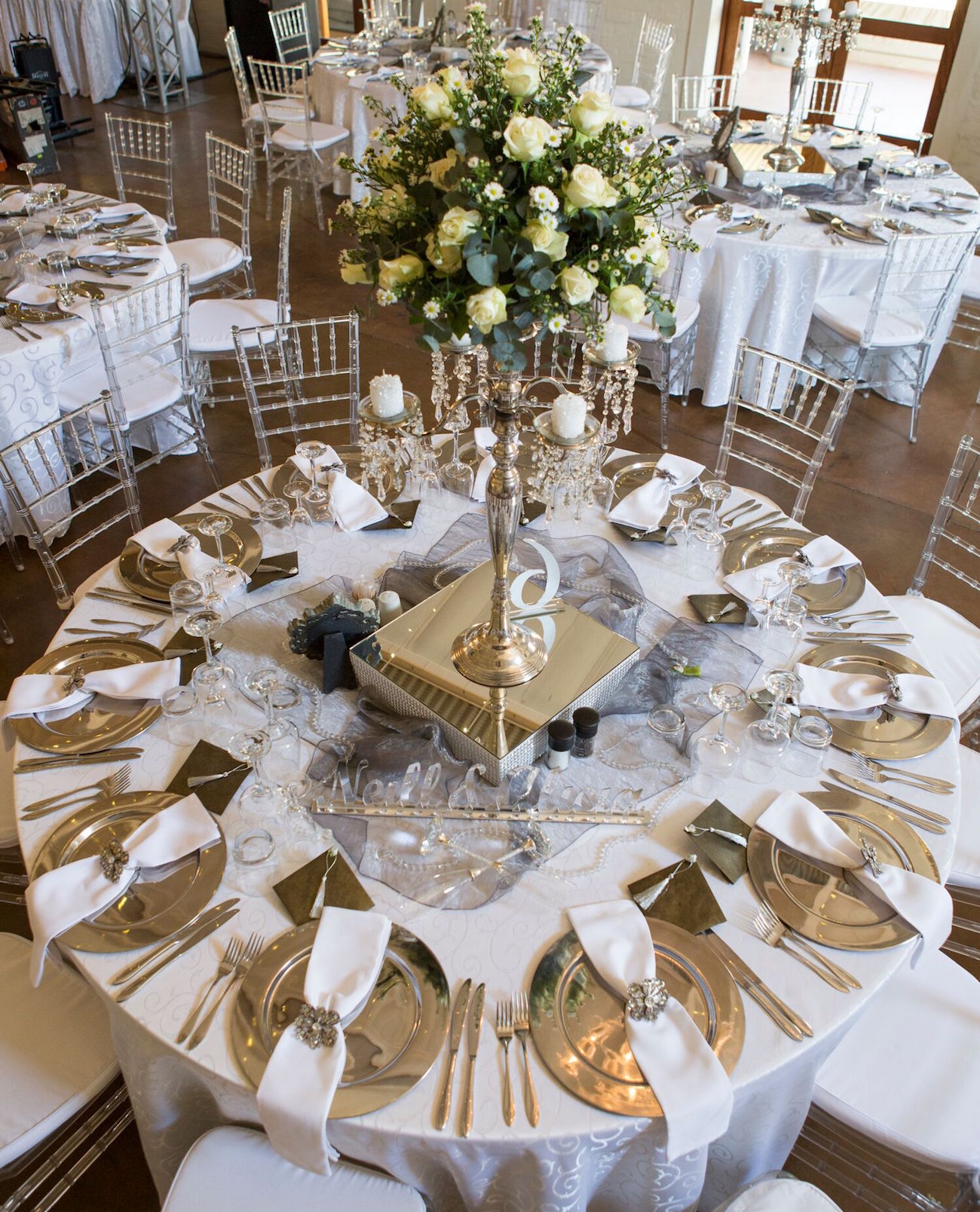 White & Silver Wedding Decor | Image: Daniel West