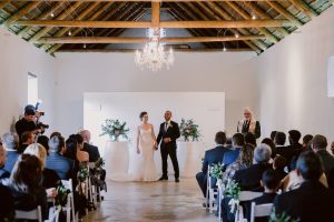 Wedding Ceremony in Wine Cellar | Image: Lad & Lass Photography