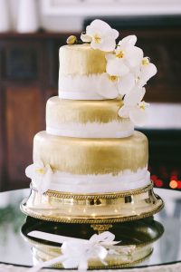 Gold Tiered Wedding Cake | Credit: Jani B & Bright and Beautiful