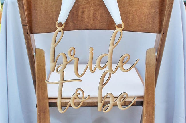 rustic bridal shower chair sign
