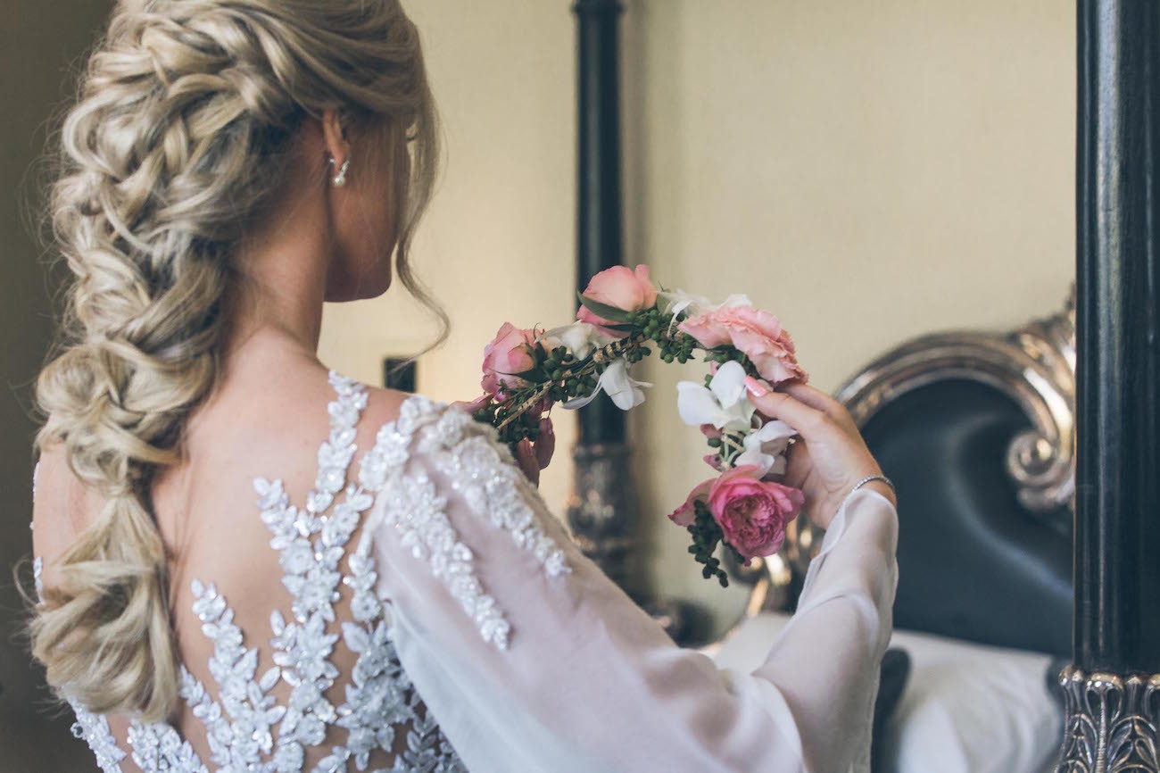 Bride with floral crown | Credit: Shanna Jones