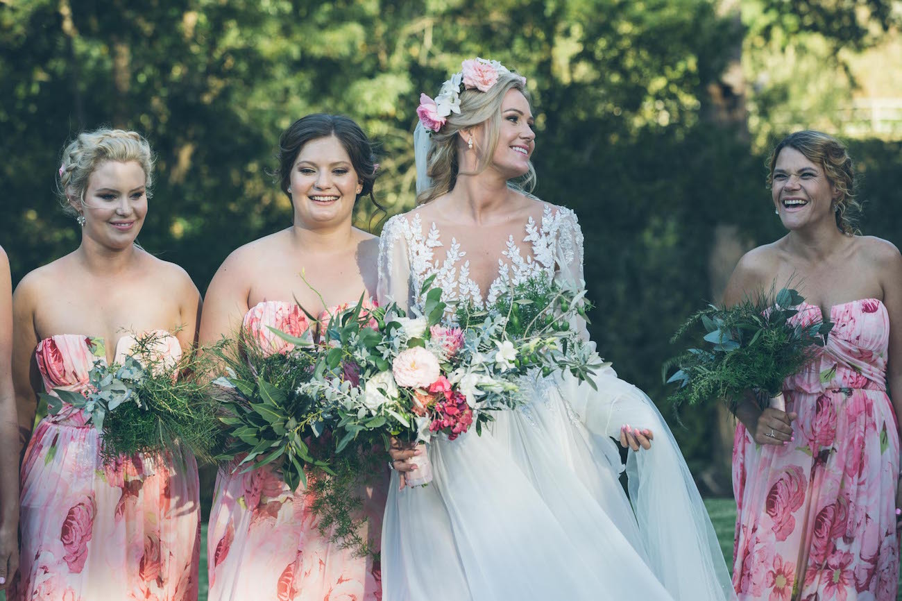 Bridesmaids in floral print | Credit: Shanna Jones