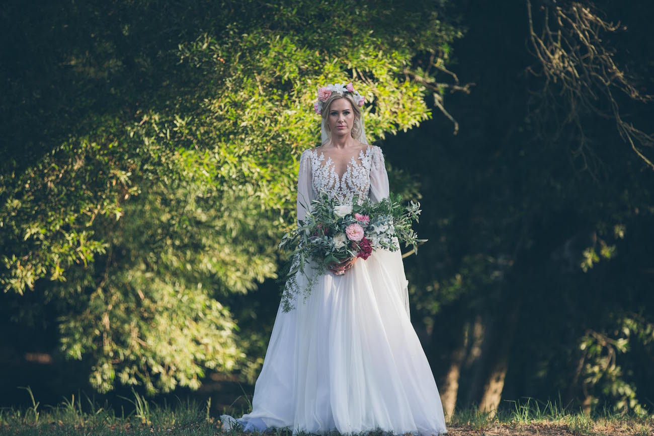 Zuhair Murad illusion lace wedding dress with sleeves | Credit: Shanna Jones