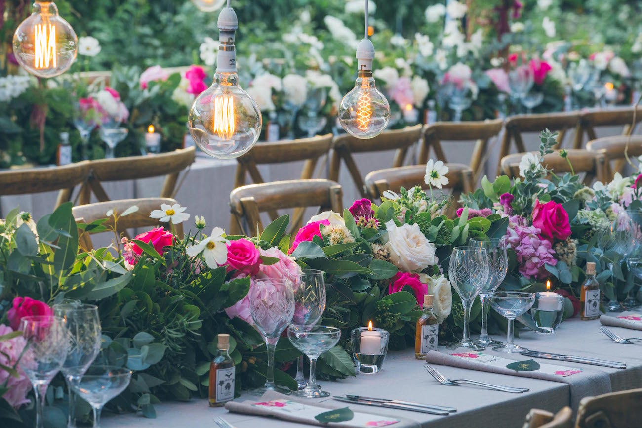 Lush floral wedding tables | Credit: Shanna Jones