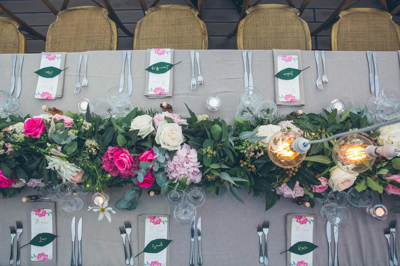 Table decor with leaf place cards | Credit: Shanna Jones