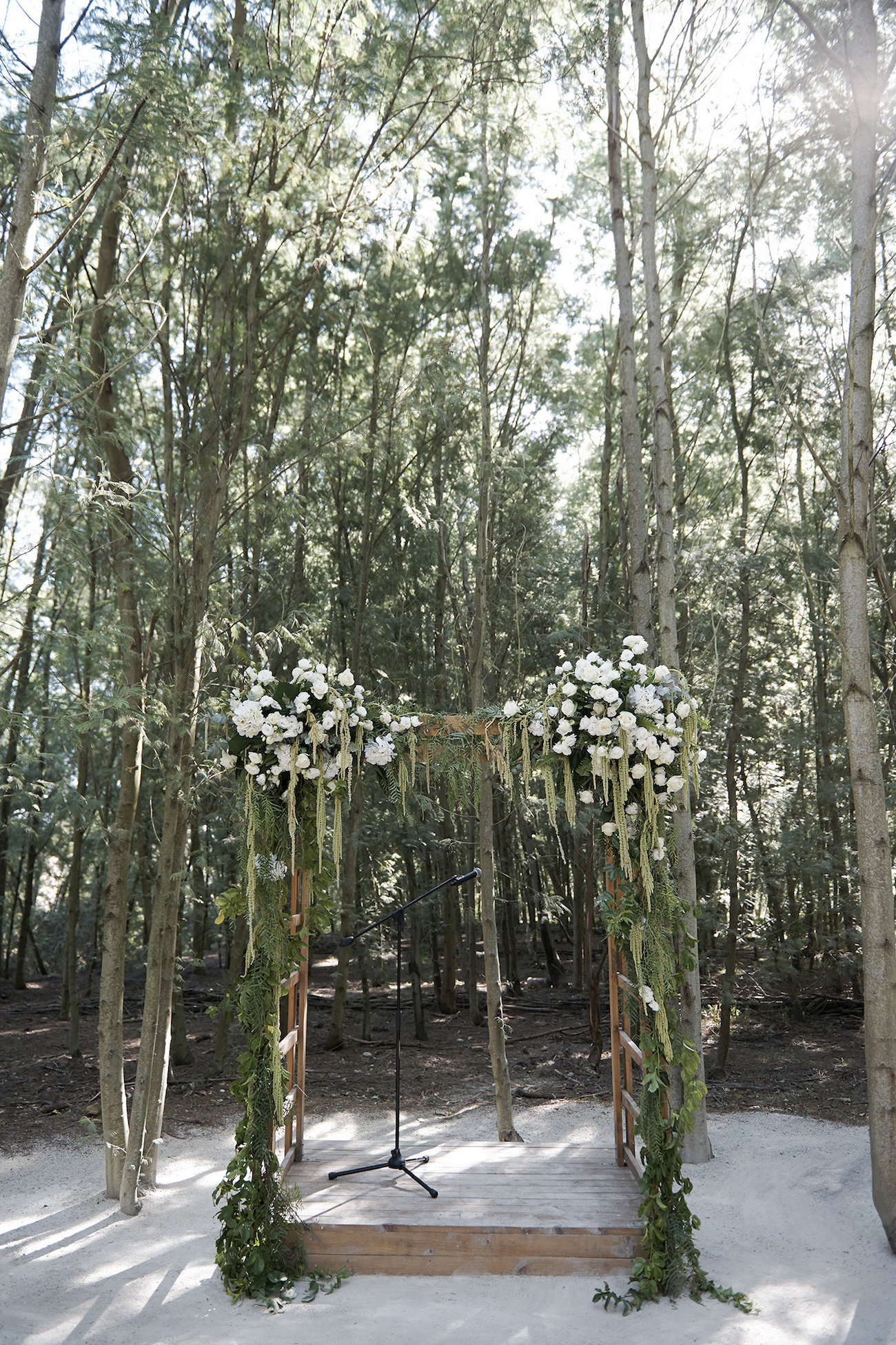 Wooden Floral Ceremony Arch | Image: Knit Together Photography