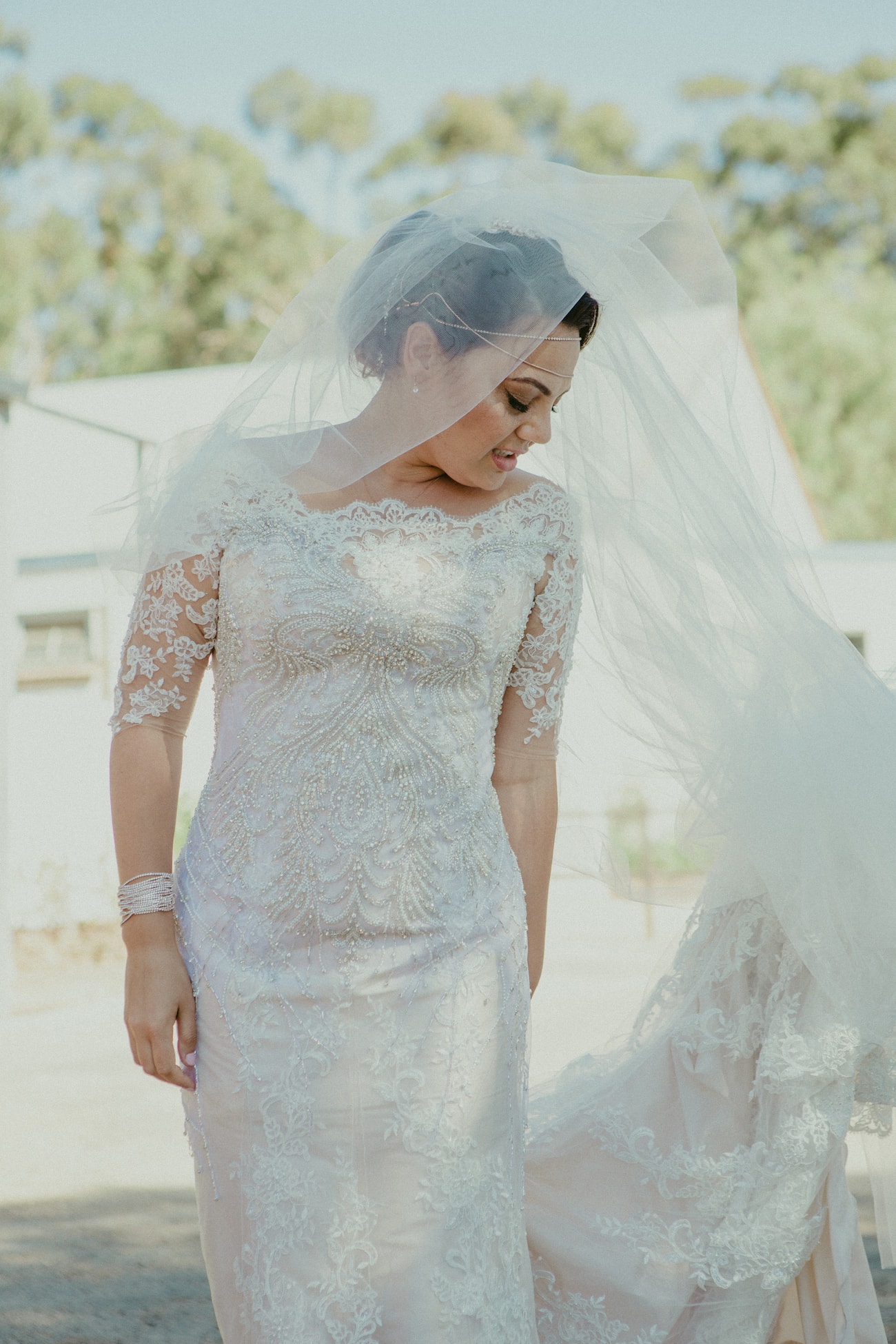 Beaded Lace Wedding Dress | Credit: Vivid Blue