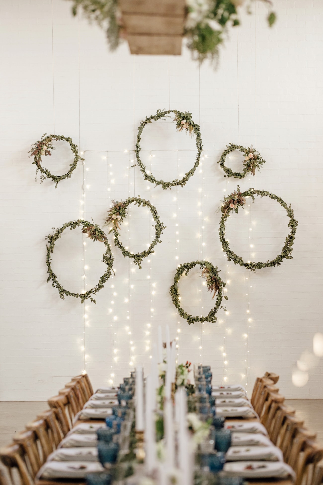 Hanging Greenery Wreaths | Credit: Page & Holmes