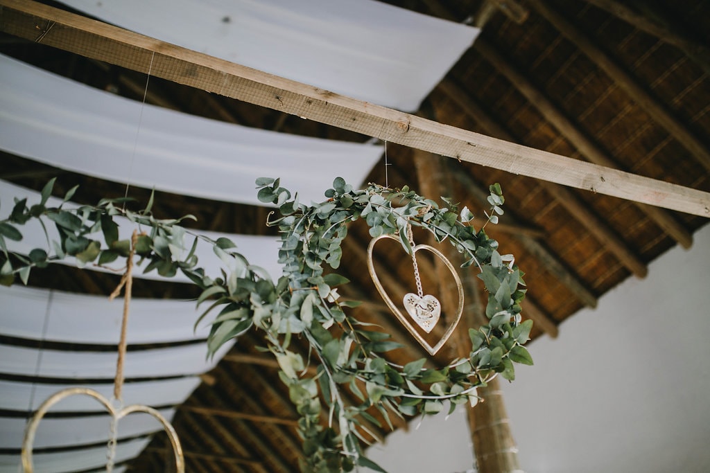 Greenery Wreath Ceremony Decor | Image: Jessica J Photography