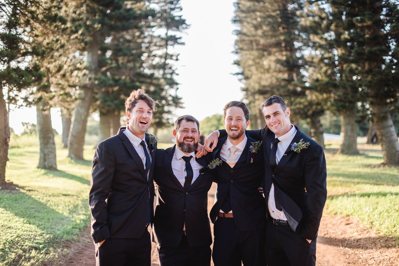 Groomsmen in Black Suits | Image: Roxanne Davison