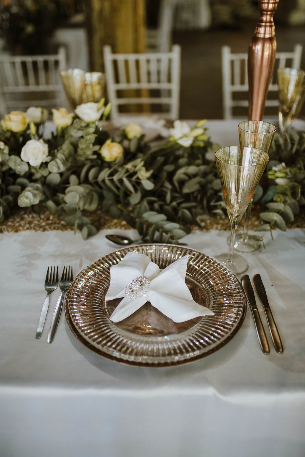 Glam Rustic Okace Setting with Sequin Linens, Greenery Runner & Mercury Glass | Image: Jessica J Photography