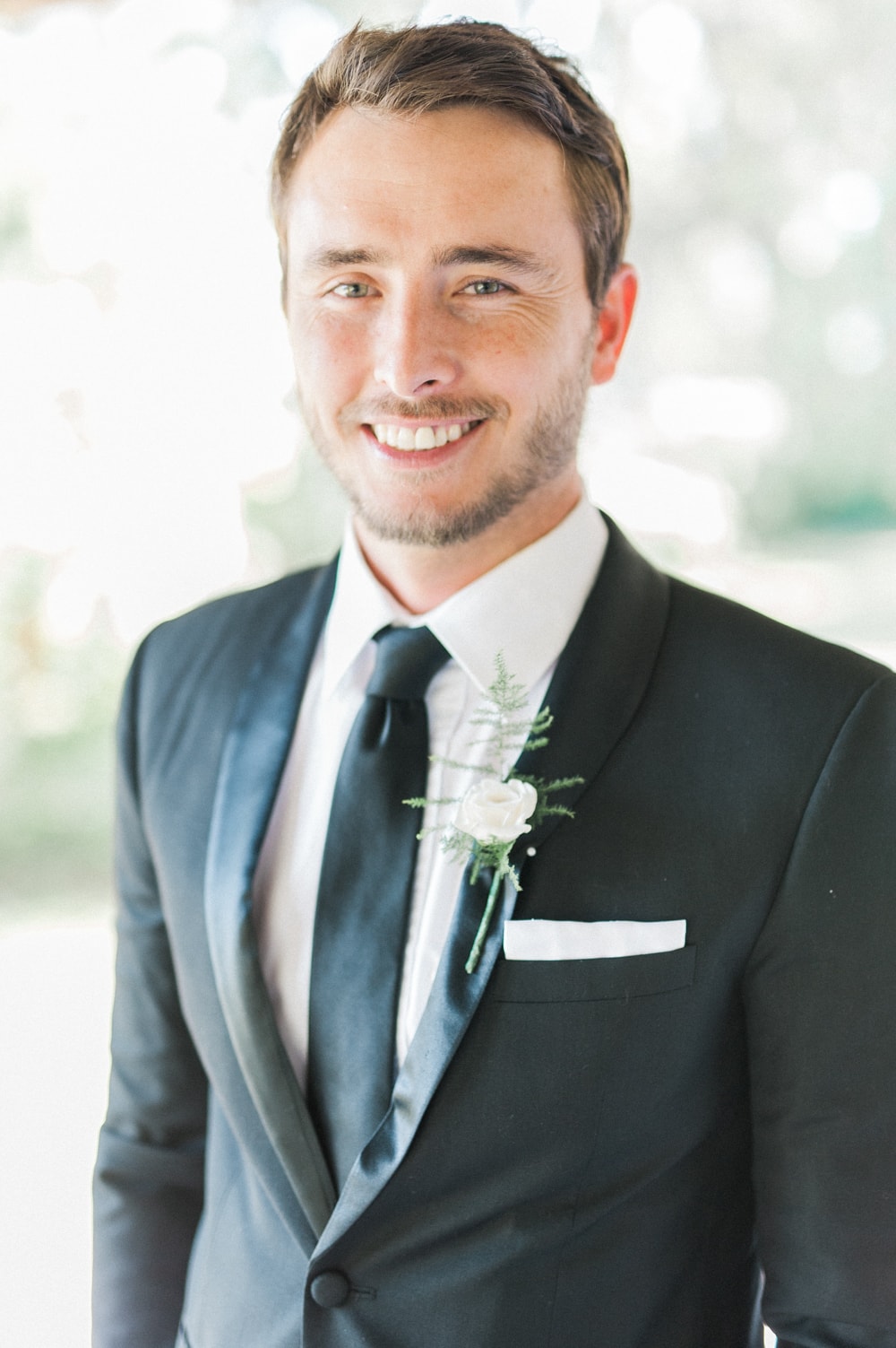 Groom in Classic Black Suit & Tie | Image: Bright Girl Photography