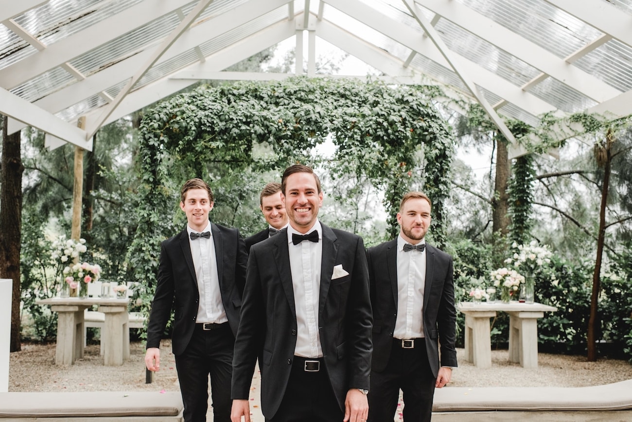 Groomsmen in Black Suits | Image: Carla Adel