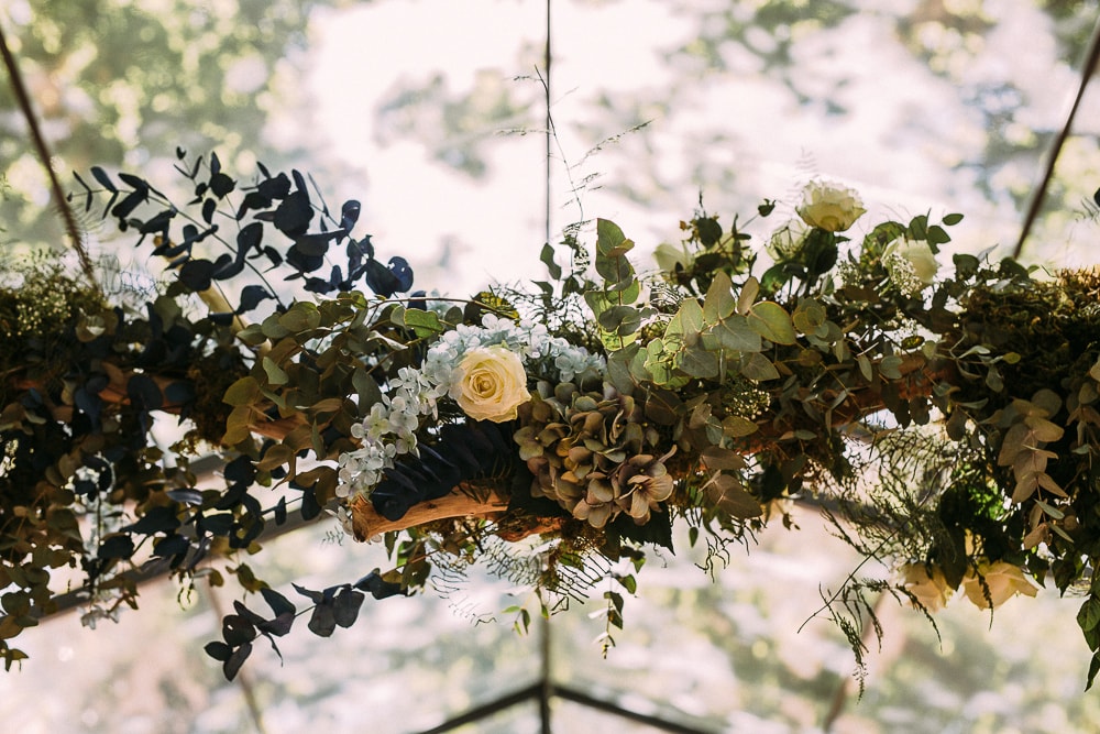 Hanging Florals for Forest Wedding | Image: Hayley Takes Photos